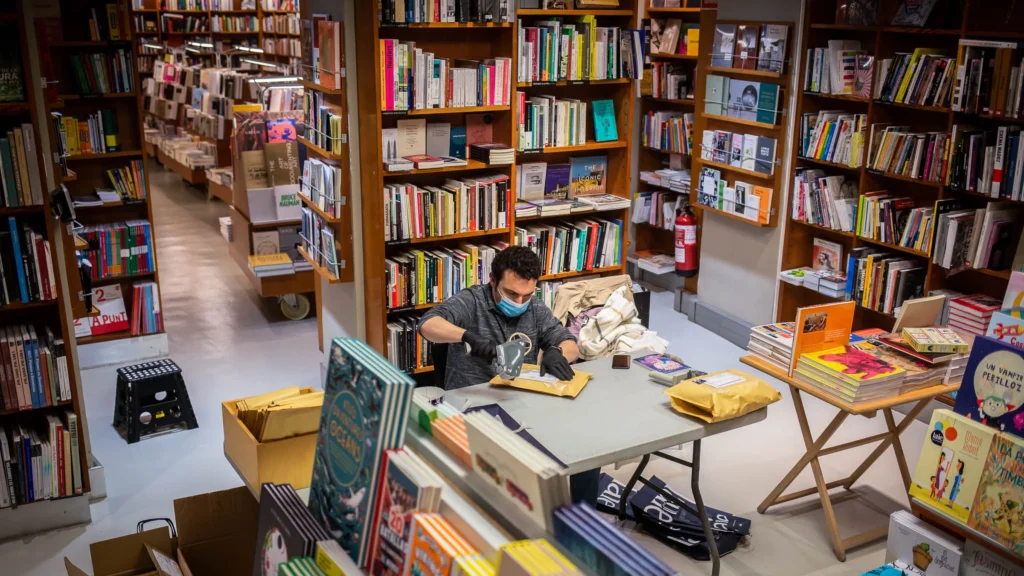 man packing a book