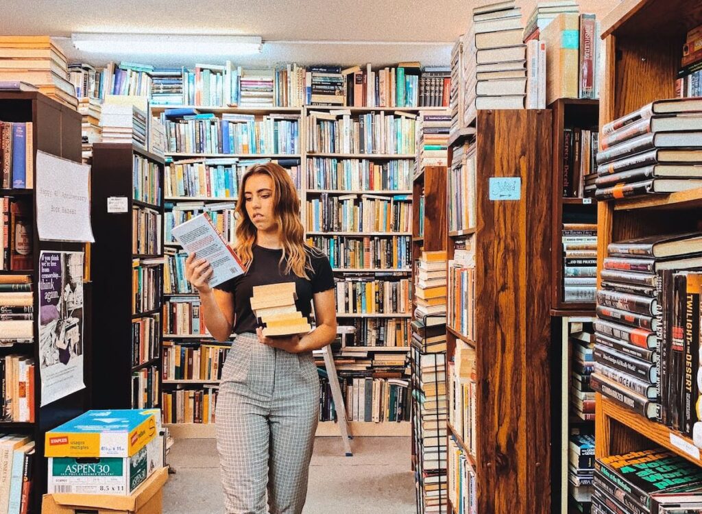 woman with book in her hand